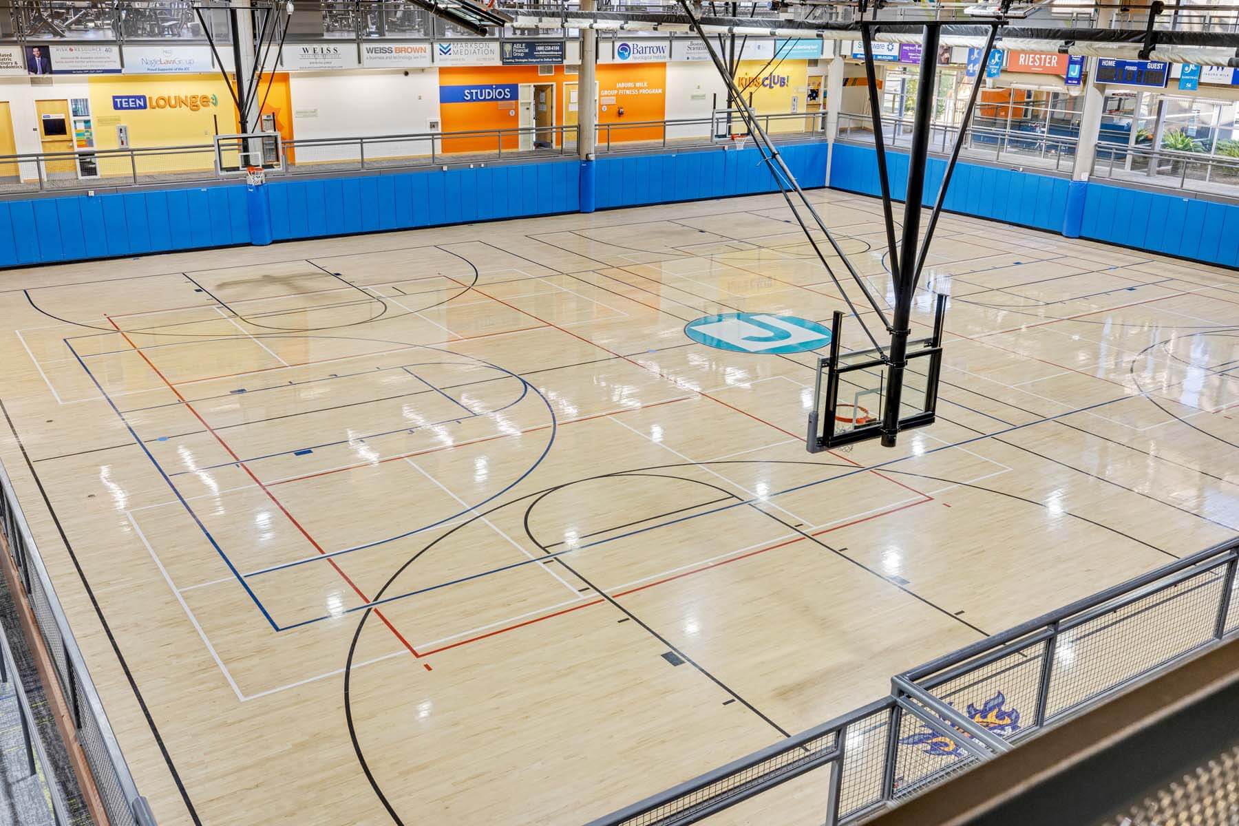 An overhead view of the large basketball court at the J.